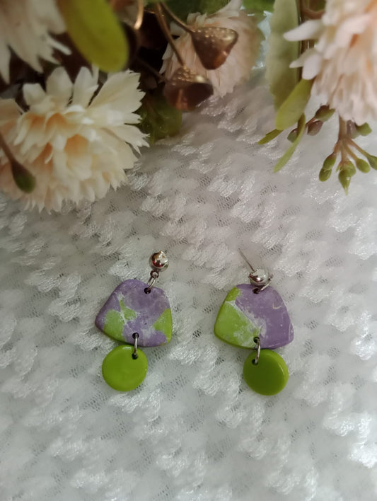 "Handcrafted Earrings with Floral Charm"