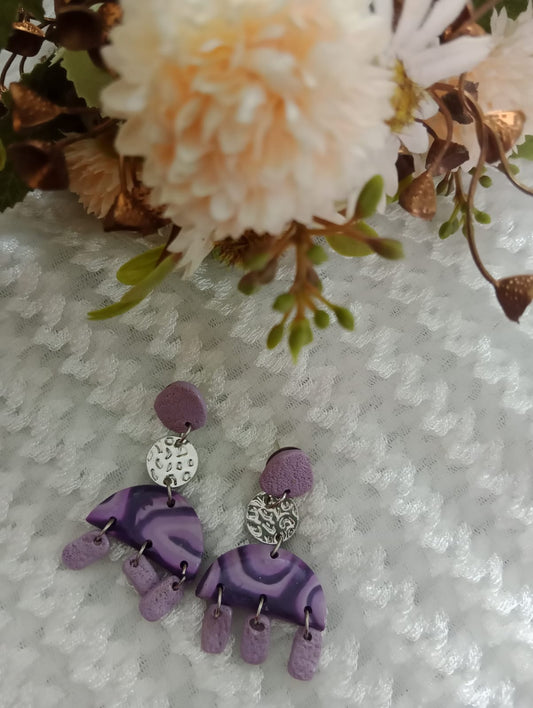 "Handcrafted Purple Elegance: Floral Polymer Clay Earrings"