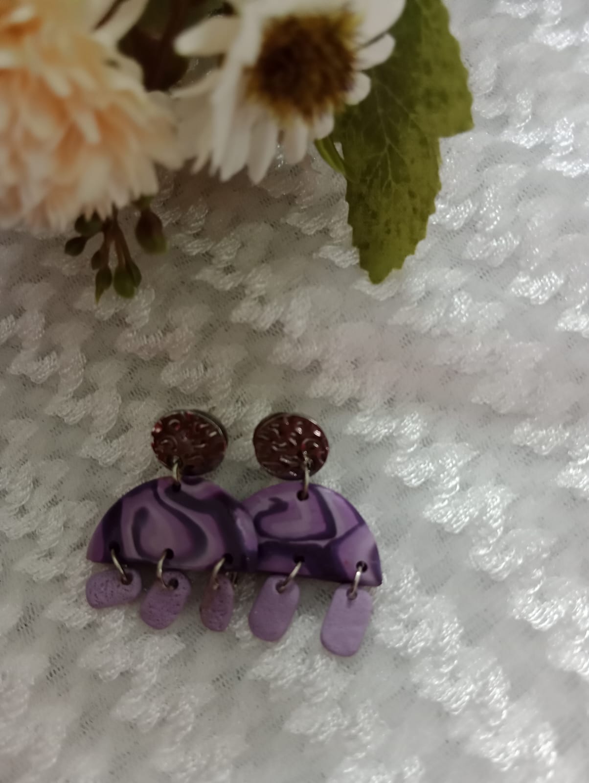 "Handcrafted Purple Swirl Dangle Earrings: Unique & Elegant"